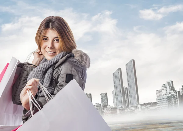 Donna con shopping bags — Foto Stock