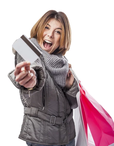 Wanita dengan tas belanja dan kartu kredit — Stok Foto