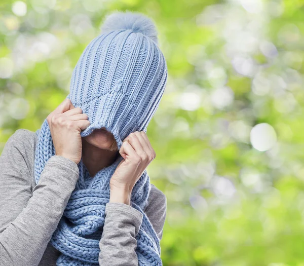 Woman covering head — Stock Photo, Image