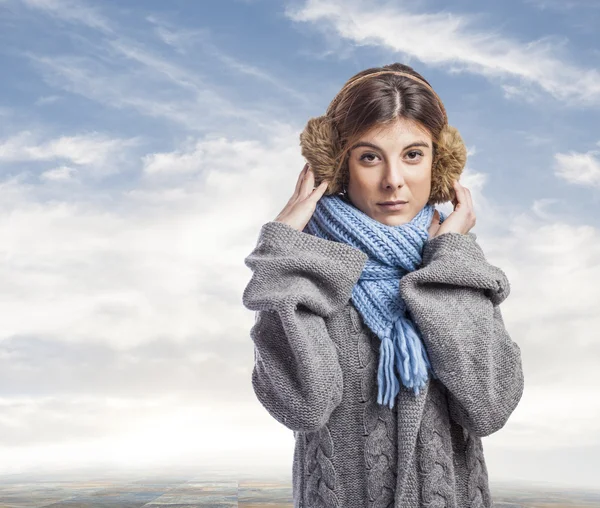 Mulher nos auriculares — Fotografia de Stock