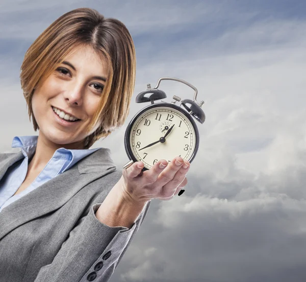 Mujer de negocios con reloj — Foto de Stock