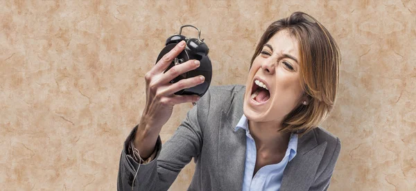 Woman screaming to clock — Stock Photo, Image