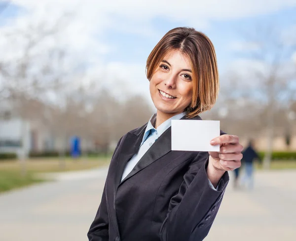 Business woman with card — Stock Photo, Image