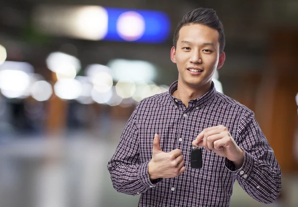 Man holding car key — Stock Photo, Image