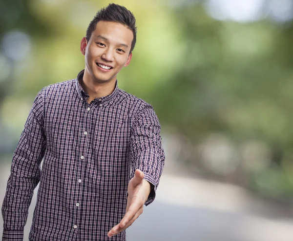 Mann macht Willkommensgeste — Stockfoto