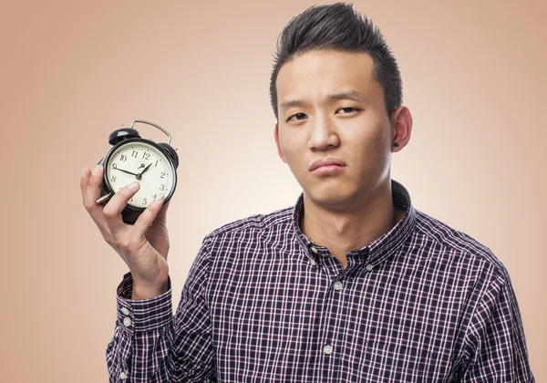 Man holding clock — Stock Photo, Image