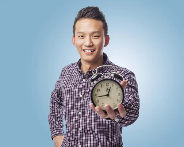 Man holding clock — Stock Photo, Image