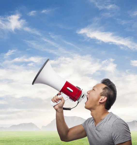 Man shouting with megaphone — Stock Photo, Image