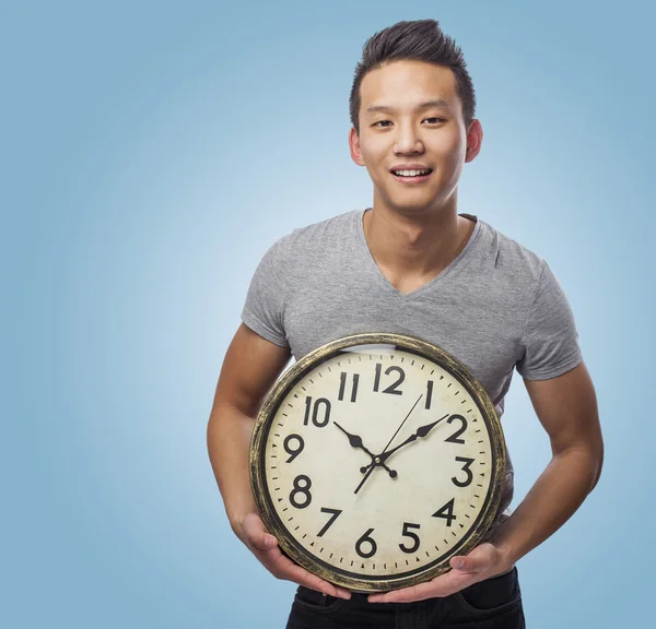 Man holding clock — Stock Photo, Image