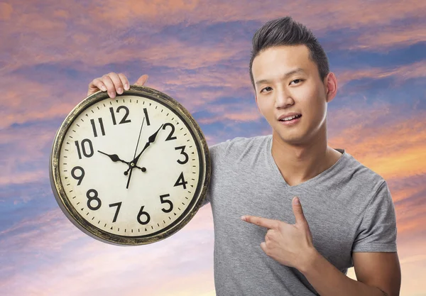 Man holding clock — Stock Photo, Image