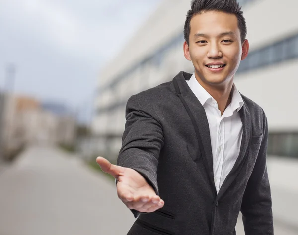 Business man offering help — Stock Photo, Image