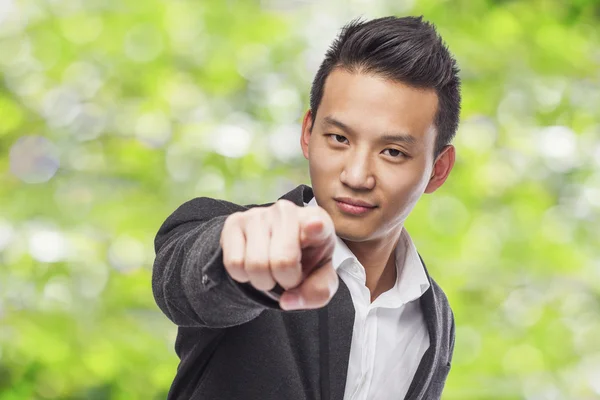 Zakenman wijzen naar voorgrond — Stockfoto