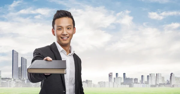 Man holding book — Stock Photo, Image