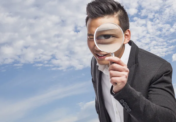 Man with magnifying glass — Stock Photo, Image