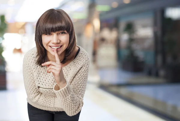 Vrouw doen stilte teken — Stockfoto