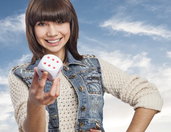 Woman showing dice — Stock Photo, Image