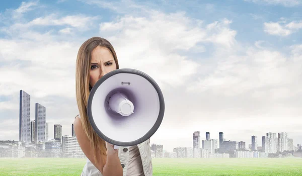 Mulher com megafone — Fotografia de Stock