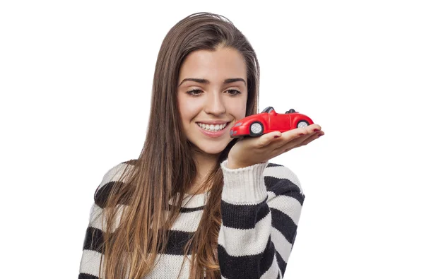 Mujer sosteniendo coche — Foto de Stock