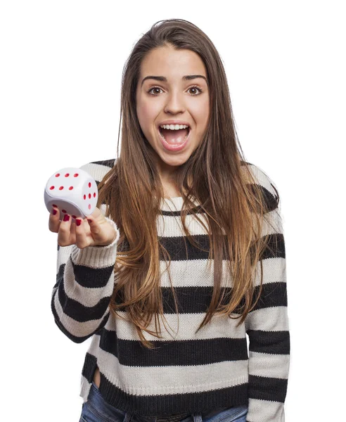 Woman holding dice — Stock Photo, Image