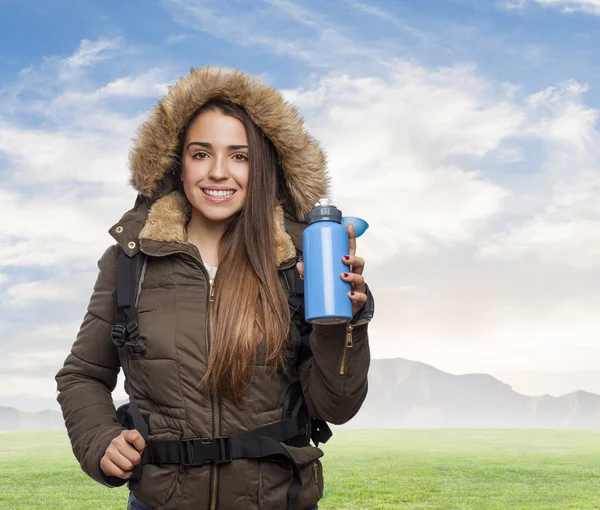 Woman holding bottle — Stock Photo, Image