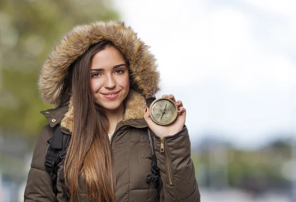 Woman holding compass — Stock Photo, Image