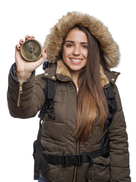 Woman holding compass — Stockfoto