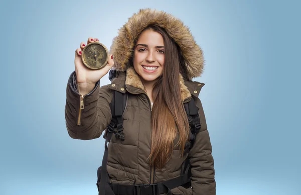 Woman holding compass — Stock Photo, Image