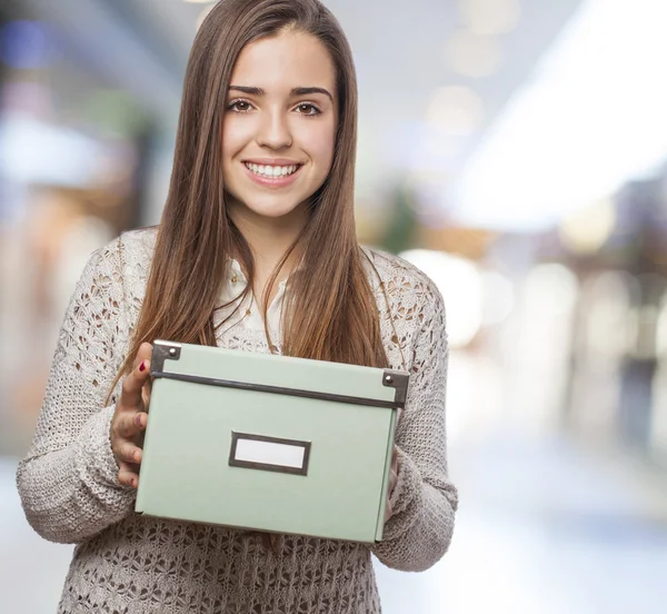 Woman holding box — Stock Photo, Image