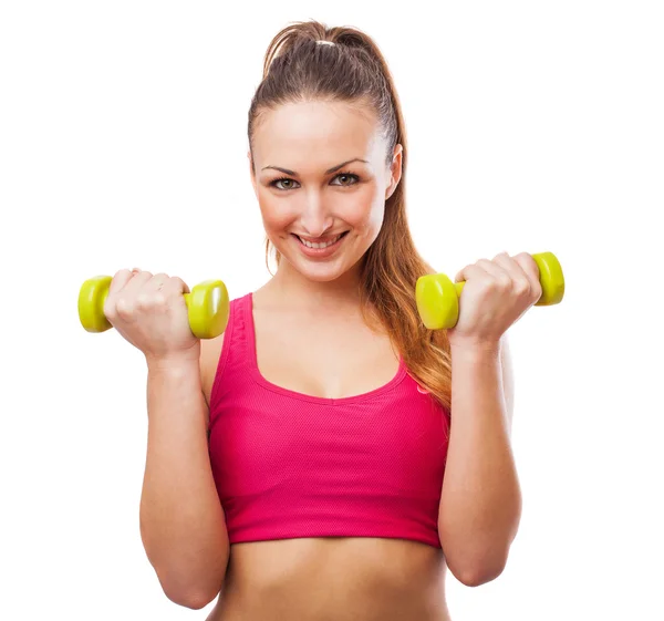 Woman holding weights — Stock Photo, Image