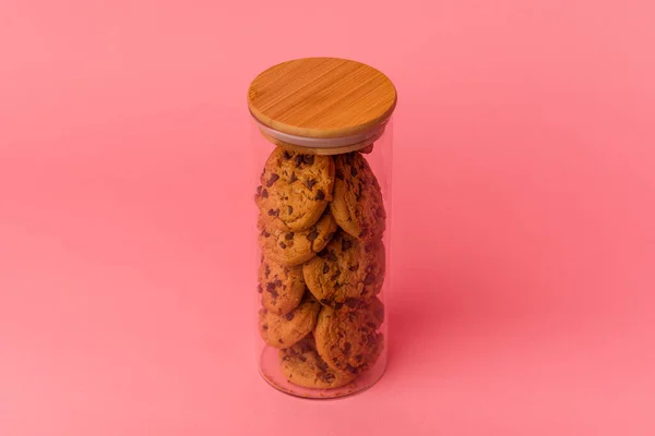 Cookies jar isolated on pink background