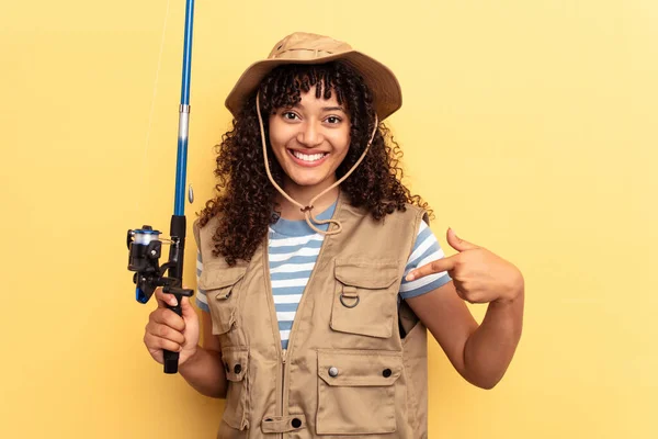 Young Mixed Race Fisherwoman Holding Rod Isolated Yellow Background Person — Stock Photo, Image