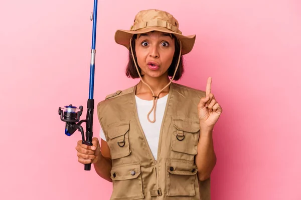 Young Mixed Race Fisherwoman Holding Rod Isolated Pink Background Having — Stock Photo, Image
