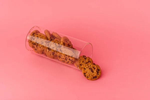 Cookies jar isolated on pink background