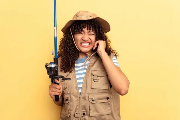 Young Mixed Race Fisherwoman Holding Rod Isolated Yellow Background Covering — Stock Photo, Image