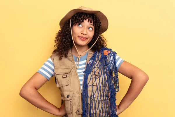 Young Mixed Race Fisherwoman Holding Net Isolated Yellow Background — Stock Photo, Image