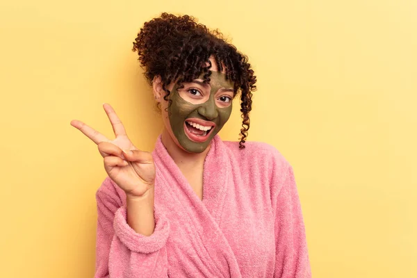 Young Mixed Race Wearing Facial Mask Isolated Yellow Background Joyful — Stock Photo, Image