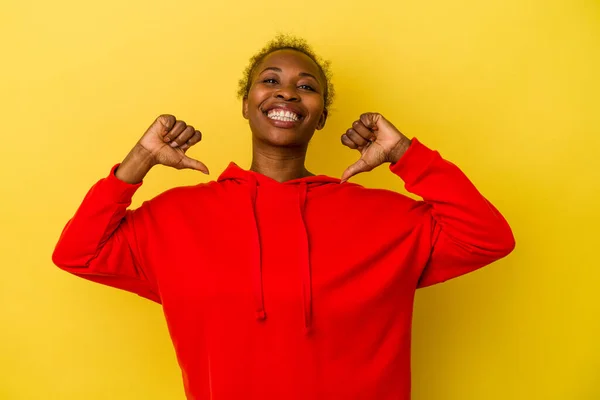 Young African American Woman Isolated Yellow Background Feels Proud Self — Stock Photo, Image
