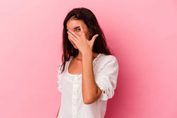 Young Caucasian Woman Isolated Pink Background Blink Camera Fingers Embarrassed — Stock Photo, Image