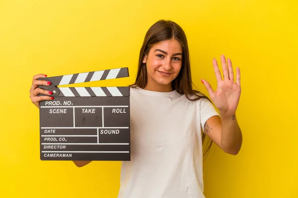 Young Caucasian Woman Holding Clapperboard Isolated White Background Smiling Cheerful — Stock Photo, Image