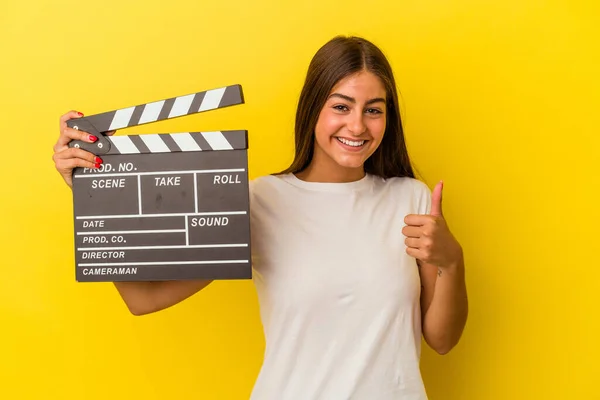 Young Caucasian Woman Holding Clapperboard Isolated White Background Smiling Raising — Stock Photo, Image