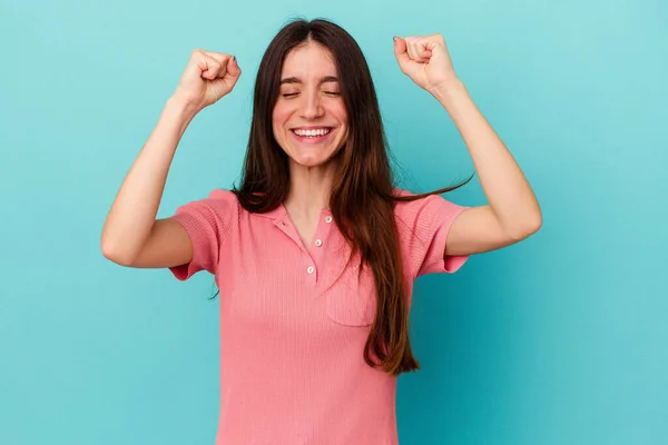 Young Caucasian Woman Isolated Blue Background Celebrating Victory Passion Enthusiasm — Stock Photo, Image