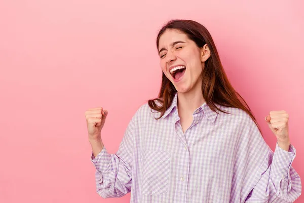 Young Caucasian Woman Isolated Pink Background Raising Fist Victory Winner — Stock Photo, Image