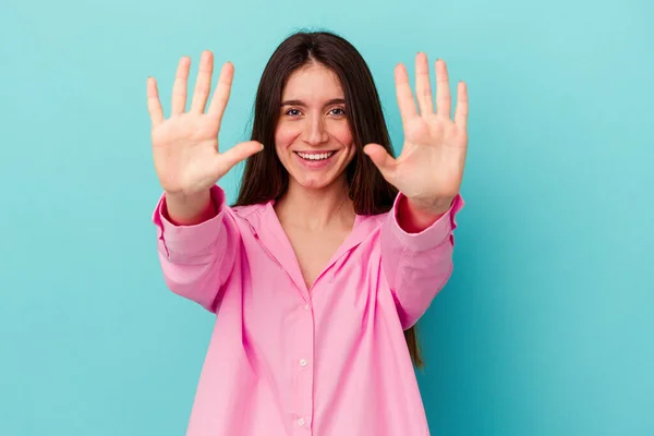 Young Caucasian Woman Isolated Blue Background Showing Number Ten Hands — Stock Photo, Image