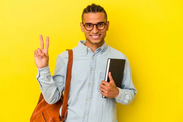 Young Venezuelan Student Man Isolated Yellow Background Joyful Carefree Showing — Stock Photo, Image