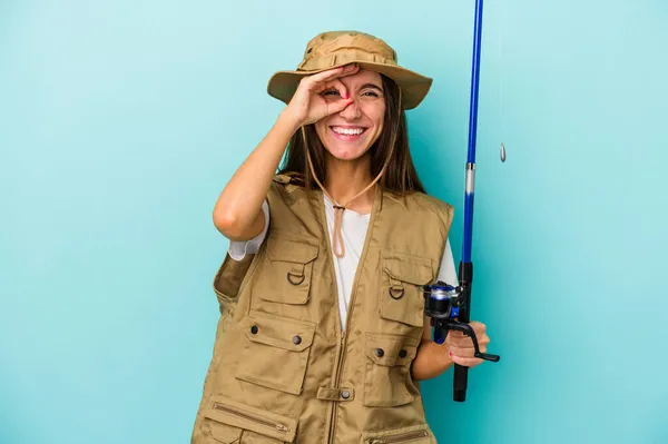 Young Caucasian Fisherwoman Isolated Blue Background Excited Keeping Gesture Eye — Stock Photo, Image