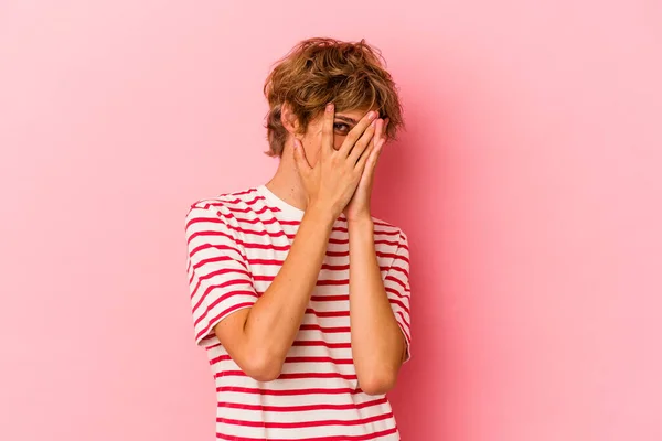 Young Caucasian Man Make Isolated Pink Background Blink Camera Fingers — Stock Photo, Image