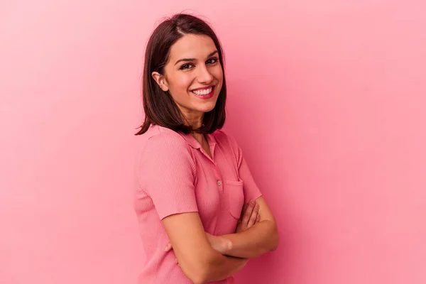stock image Young caucasian woman isolated on pink background laughing and having fun.