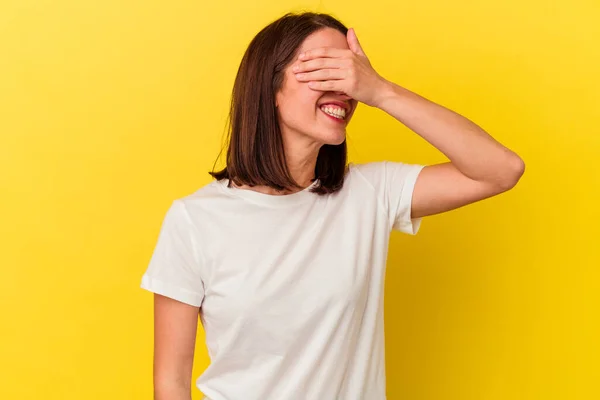 Young Caucasian Woman Isolated Yellow Background Laughs Joyfully Keeping Hands — Stock Photo, Image