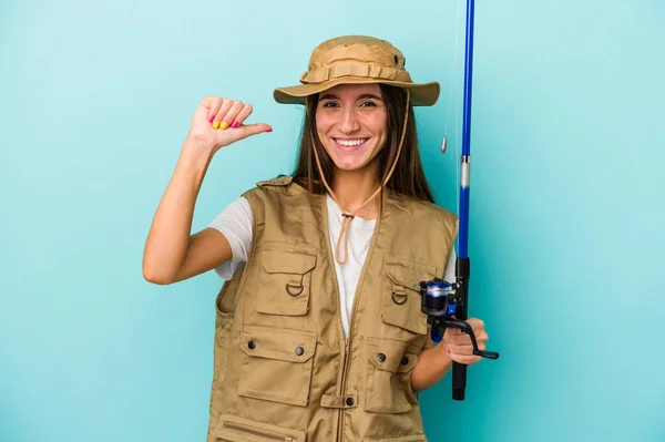 Young Caucasian Fisherwoman Isolated Blue Background Feels Proud Self Confident — Stock Photo, Image