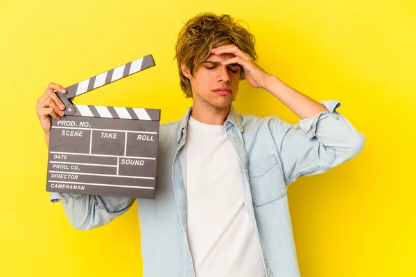 Young Caucasian Man Makeup Holding Clapperboard Isolated Yellow Background Being — Stock Photo, Image